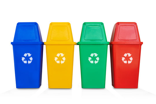 four colorful recycle bins isolated on a white background