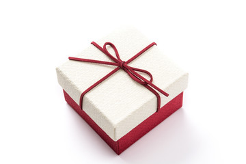 White and red gift box isolated on white background.