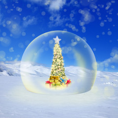 Decorated Christmas tree with colorful lights and ornaments in glass sphere on snow covered landscape