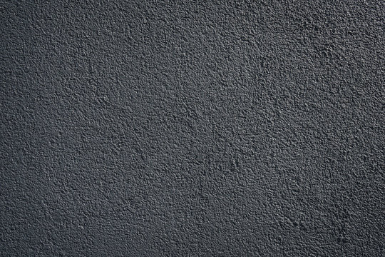 black or dark gray wall roughcast plaster background texture pattern