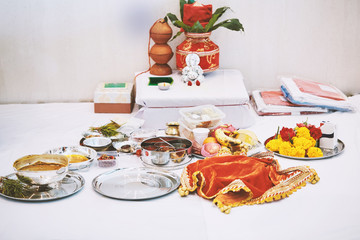 The worship items for thread ceremony (puja, pooja) focus on the Ganesha statue