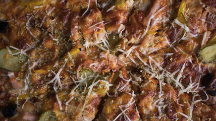 Pizza background - macro shot of pizza