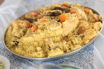Maqluba traditional Arab food.The dish includes meat, rice, and