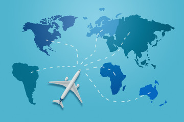 Travel around the world concept. Small plane model on the blue world map with different flight destinations