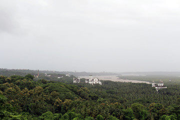 Fototapeta premium The view of Old Goa (Goa Velha) as seen from the hill of The Church of Our Lady of the Mount