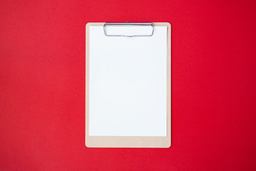 Vintage office space paper list mockup flat lay on red table top background texture concept white blank note on workspace desk, pastel plan note 2019, business valentine back to School.