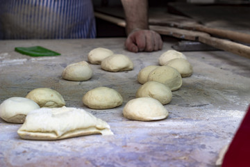Perspective shoot of dough preparation to make traditional turkish bread food with flours