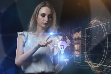 The concept of business, technology, the Internet and the network. A young entrepreneur working on a virtual screen of the future and sees the inscription: