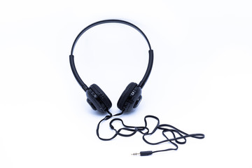 Black headphones on a white background