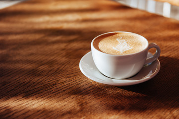 coffee cup latte art in cafe