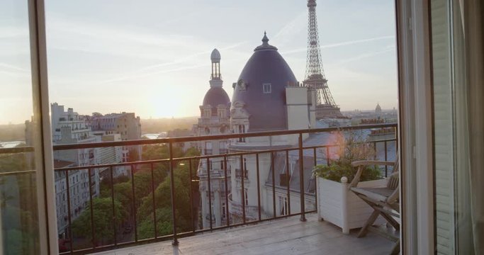 view of paris eiffel tower beautiful sunset over romantic french city on luxury apartment balcony travel vacation concept