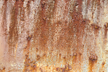 Rust covered weathered iron steel metal background with rusty peeling blistering paint