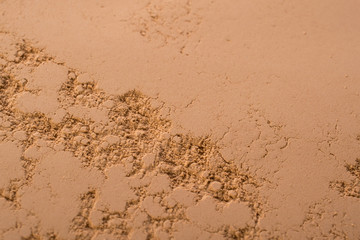 Cosmetic clay texture, background. Natural mask, dry clay for the face and body.