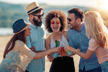 Friends having party on the beach