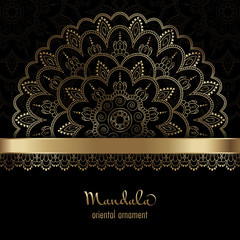 Golden vintage greeting card on a black background. Ethnic mandala pattern. Hand drawn illustration