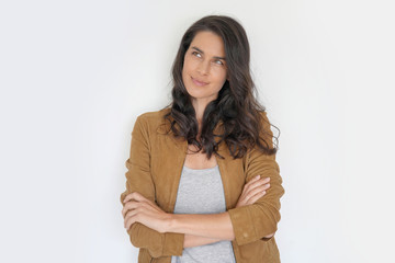 Fototapeta premium Brunette woman standing on white background, isolated