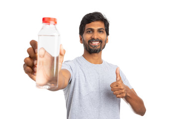 Man showing thumb up gesture with water bottle
