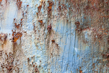 Rust covered weathered iron steel metal background with rusty peeling blistering paint