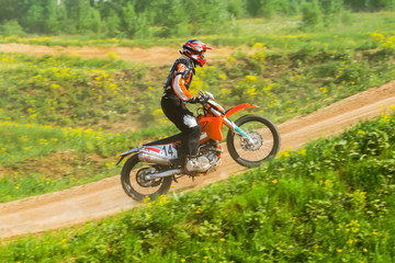 Motocross rider in the action
