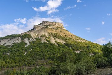 Fototapeta na wymiar Ancient cave city on mount Tepe-Kermen in Crimea