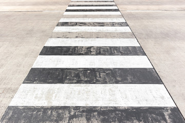 Obraz premium Pattern of cross walk crossing the concrete road.