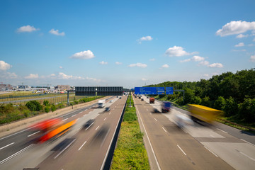 Autobahn highway with blurred trucks Frankfurt Germany