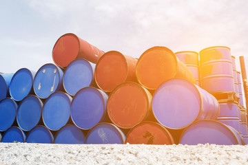 Oil barrels tanks or chemical drums with sun light