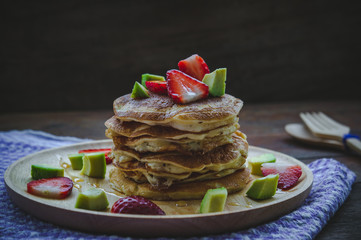 pancake strawberry avocado fruit and honey syrup sweet dessert on wood table pan cake dessert homemade