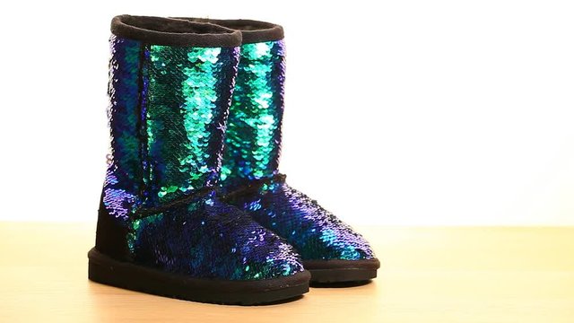 Girl shoes wooden table white background hd footage