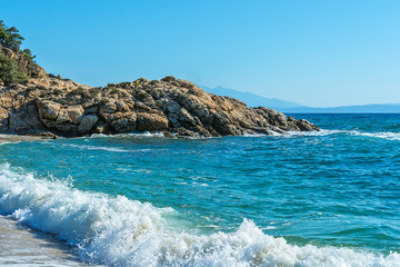 Fototapeta premium Panoramic view of Aegean sea at Chalkidiki, Greece. Proti Ammoudia beach, one of the most beautiful beaches in the Aegean Sea.