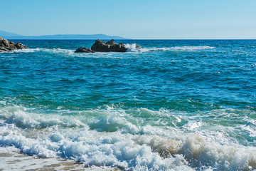 Fototapeta premium Panoramic view of Aegean sea at Chalkidiki, Greece. Proti Ammoudia beach, one of the most beautiful beaches in the Aegean Sea.