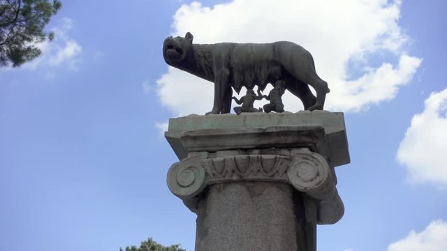 Statue of she-wolf on Capitoline hill in slow motion. Twins founders of Rome city - Romulus and Remus - suckling she-wolf. Icon of Italian capital Rome city
