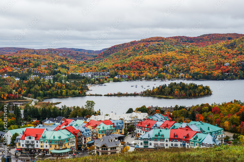 Wall mural mont tremblant village at fall as the foliage change for vibrant colors, quebec, canada