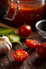 tomato sauce ketchup homemade food kitchen wooden background
