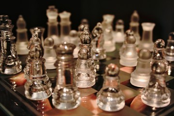 Fototapeta na wymiar Transparent chess in chess board.