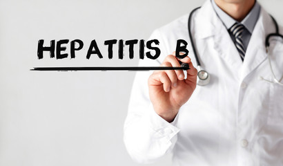 Doctor writing word Hepatitis b with marker, Medical concept