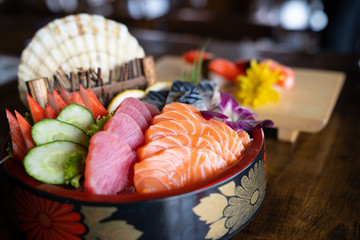 Close up Mixed sashimi, big sashimi plate,Sashimi salmon set, raw fish, japanese food in Asian restuarant .(Selective focus). Vivid color