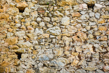 Textura de piedra con huecos de andamios
