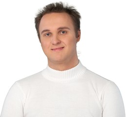 Fototapeta premium Portrait of young businessman in white sweater with hairstyle