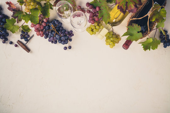 Wine composition on rustic background
