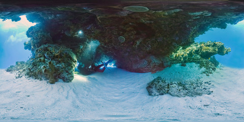 Diver under overhang in Mexico