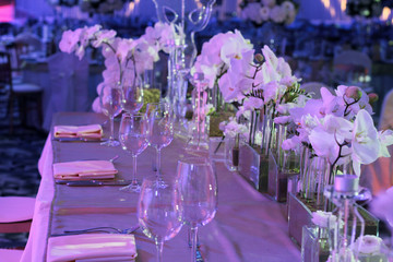 Wedding table flower decoration. Orchid bouquet. Restaurant ,Glamorous Event, celebration