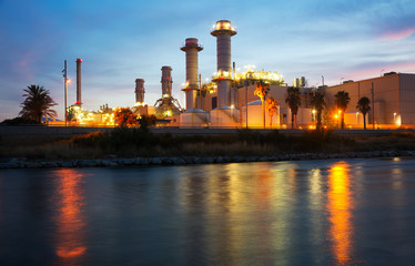 Fototapeta na wymiar power plant and river in evening