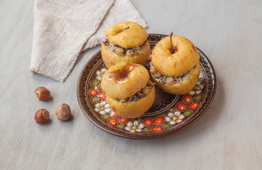 Baked apples with raisin, poppy seeds, rice and honey. Flat Lay