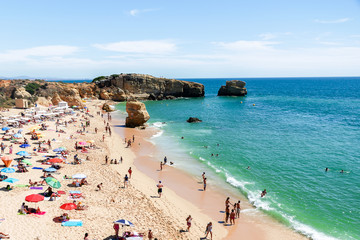 Fototapeta na wymiar Scenic beach, at Algarve, Portugal with turquoise sea in background