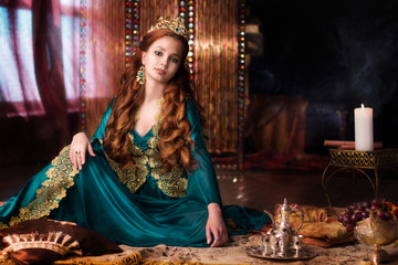 Girl at the image of Turkish sultan's wife