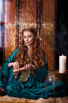 Girl at the image of Turkish sultan's wife