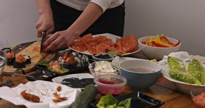 All table is full of sushi ingredients