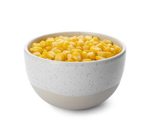 Bowl with corn kernels on white background