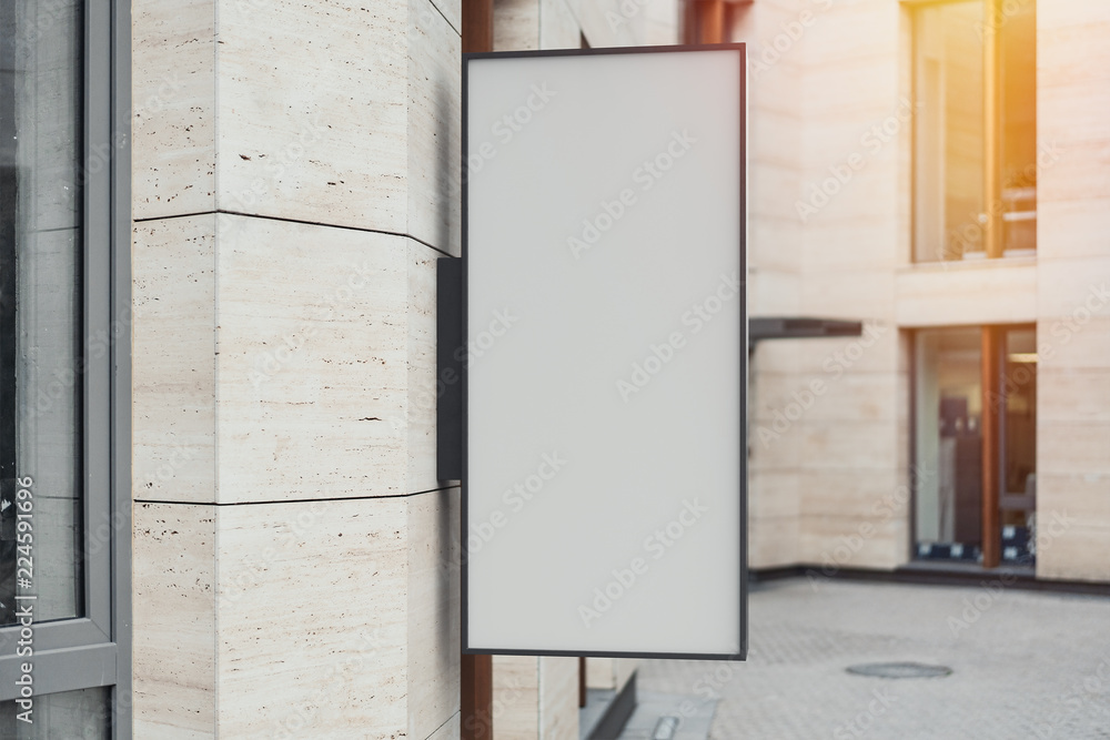 Poster blank store signboard. empty shop lightbox on the wall. 3d rendering.